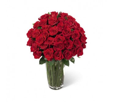 L'arrangement Luxueux de Roses Rouges